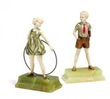 Ferdinand (Fritz) Preiß, 'Sonny Boy' und 'Hoop Girl', Kalt bemalte Bronze, Elfenbein, jeweils grüner Onyxsockel