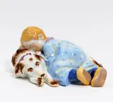 Schlafendes Kind mit Hund by Meissen, Porzellan, farbiges Dekor, sold May 2019