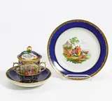 Meissen, Trembleuse mit floralen Reserven und Teller mit Landschaft, 19./20. Jh, Porzellan, farbig und gold staffiert