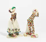 Figurenpaar Harlekin und Harlekine by Nymphenburg, 20. Jh, Porzellan, farbig und gold staffiert, sold Nov 2022