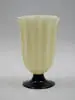 Vase by Alexander Joseph von Steuben, Ivory glass on a black foot with a ribbed body, sold May 2002