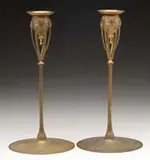 Candlesticks by Tiffany Studios, Gilded bronze with leaf ending supports to the candle cup, sold Dec 2006