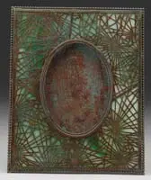 Frame by Tiffany Studios, In the Pine Needle pattern with rare oval opening, sold Nov 2008