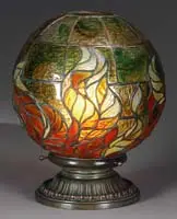 Fire Ball Lamp by Tiffany Studios, The shade rests atop a bronze saucer base with single socket, sold Nov 2008