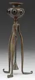 Jeweled Candlestick by Tiffany Studios, In the center of the three legs hangs a bronze snuffer, sold Nov 2008