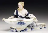 Meissen, Figural Sweet Meat Dish, The whole painted in under-glazed blue and gilt decorated