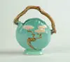 Ming Tree” Handled Basket by Roseville, sold Jan 2004
