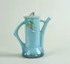 Winecraft” Covered Chocolate Pot by Roseville, sold Jan 2004
