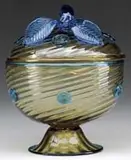 Covered Dish by Alexander Joseph von Steuben, Steuben pedestal topaz swirled glass dish with Celeste Blue prunts and trim, sold Jun 2010