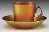 Gold Aurene Cup and Saucer by Alexander Joseph von Steuben, sold Jun 2010