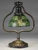 Desk Lamp by Tiffany Studios, Lamp begins with a bronze base that carries a green-brown patina finish, sold Jun 2008