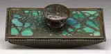 Grapevine Rocker Blotter by Tiffany Studios, Etched metal grapevine pattern over green striated glass, sold Jun 2007