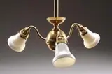 Alexander Joseph von Steuben, Brass Chandelier, Brass fixture supports three carved Ivorene shades