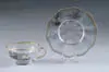 Teacup and Saucer by Daum, sold May 2004