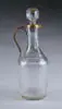 Decanter by Daum, Clear glass decanter accented by gold gilt with stopper, sold May 2004