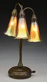 Three Light Lily Lamp by Tiffany Studios, sold Nov 2015