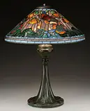 Poppy Table Lamp by Tiffany Studios, Mottled background glass shows lavender and fiery orange when lit, sold Nov 2015
