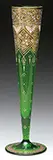 Decorated Vase by Mary Moser, All set against emerald green glass background, sold Jun 2016