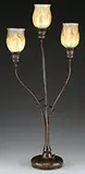 Three Light Tulip Lamp by Tiffany Studios, Bronze tendril gently wraps around three arms, sold Jun 2016