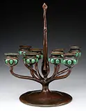 Tiffany Studios, Eight Arm Reticulated Candelabra, Each arm leads to a reticulated candle cup with blown out glass inserts