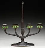Four Arm Candelabra by Tiffany Studios, The tall central handle houses the original bronze snuffer, sold Nov 2016