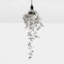 Garland chandelier by Tord Boontje, 2002, laser-cut aluminum, sold May 2024