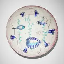 Plate with fish by Beatrice Wood, c. 1950, glazed earthenware, sold Jun 2025