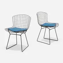 Dining chairs, pair by Harry Bertoia, 1952, enameled steel, vinyl, sold Aug 2023