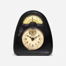 Measured Time clock and kitchen timer by Isamu Noguchi, c. 1932, Bakelite, plastic, printed paper, enameled brass, sold Aug 2023