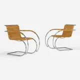 MR20 armchairs, pair by Ludwig Mies van der Rohe and Lilly Reich, chrome-plated steel, rattan, sold Aug 2023