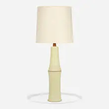 Table lamp by Gordon and Jane Martz, c. 1955, glazed earthenware, walnut, linen shade, brass, sold Aug 2023