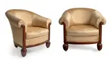 Leon Bouchet, Pair of Bergeres, carved mahogany, silk upholstery