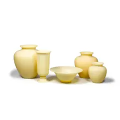 Group of Five Table Objects by Frederick Carder, for Steuben, ivory glass, comprising four vases and one bowl, one with Steuben label, sold Jul 2021