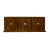 Tommi Parzinger, Sideboard, walnut, polished brass, panel doors opening to reveal drawers, shelves, and storage nooks