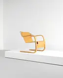 Rare armchair, model no. 42, designed 1932, executed 1930s-1940s by Alvar Aalto, Curly birch-veneered bent plywood, bent laminated birch, sold Oct 2021