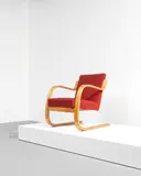 Cantilevered armchair, model no. 34/402, designed 1933 by Alvar Aalto, Bent birch laminated plywood, fabric upholstery, offered Oct 2021