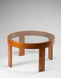 Coffee table by Gio Ponti, circa 1936, Stained walnut-veneered wood, stained walnut, glass, sold Oct 2021