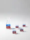 Rare carafe and four glasses from the table service set, no. 970, designed for A.P.E.M. by Gio Ponti, 1946, Clear and coloured glass, sold Oct 2021