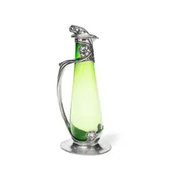 'Tudric' claret jug by Liberty & Co., circa 1903, Pewter, glass, sold Dec 2021