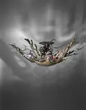 Mark Brazier-Jones, Unique and monumental 'Starfish' chandelier, designed for the White Elephant Restaurant, Athens, 1997, Patinated and gilded bronze, copper and oxidized iron, iridescent glass cabochons