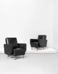 Alvar Aalto, Pair of armchairs, for the Enso-Gutzeit Headquarters, Helsinki, designed 1959, produced 1960-1962, Leather, brass