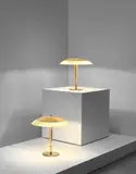 Untitled by Paavo Tynell, Brass, coloured glass, offered May 2021
