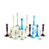 Frederick Carder, Assorted Group of 16 Candlesticks, for Steuben, glass, in various colors, shapes and sizes