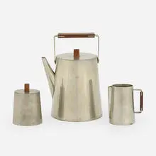 Coffee service by Paul Evans, c. 1955, pewter, rosewood, sold Aug 2023