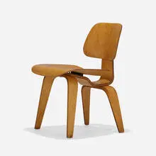 DCW by Charles and Ray Eames, c. 1945, aniline-dyed birch plywood, sold Aug 2023
