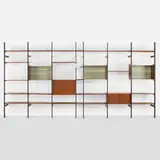 CSS (Comprehensive Storage System) by George Nelson & Associates, 1959, walnut, enameled aluminum, zinc-plated steel, glass, plastic, laminate, sold Aug 2023