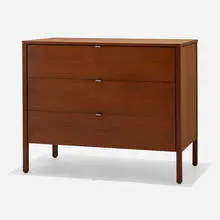 Cabinet by Florence Knoll, walnut, lacquered Masonite, chrome-plated brass, sold Aug 2023