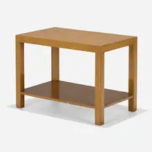 Occasional table by T. H. Robsjohn-Gibbings, c. 1950, lacquered mahogany, sold Aug 2023