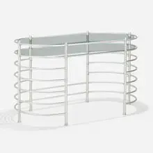Desk by Warren McArthur, c. 1935, aluminum, glass, sold Aug 2023
