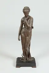 Greek School, Untitled, CLASSICAL MAIDEN WITH OIL LAMP AT FEET, metal sculpture